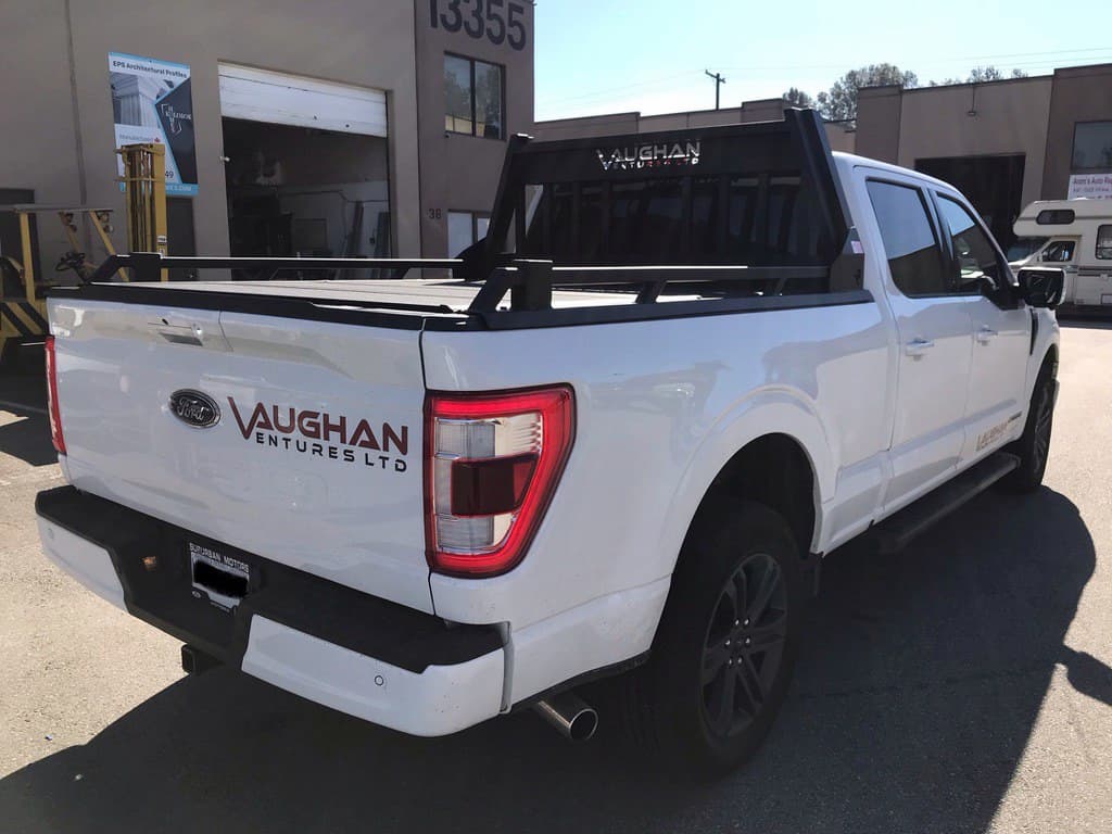 Rear-side view of Ford F-150 with custom aluminum rack, rear frame removed for a sportier, minimal look.