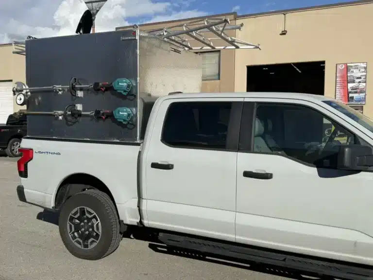 Custom landscape rack on a white pickup truck built by Ridge Rack in Surrey